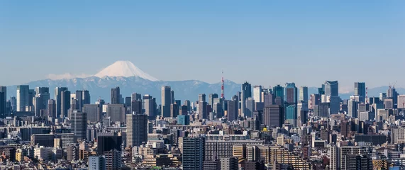 Fotobehang Tokyo city view , Tokyo downtown building and Tokyo tower landmark with Mountain Fuji on a clear day. Tokyo Metropolis is the capital of Japan and one of its 47 prefectures. © torsakarin