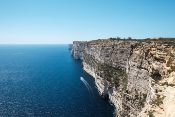 Ta Cenc Cliff and the sea at Sannat, Gozo island, Malta - walls of Calypso
