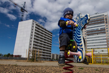 small children play on the playground