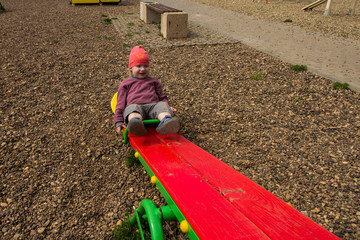 small children play on the playground