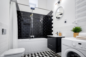 White bathroom with bathtub
