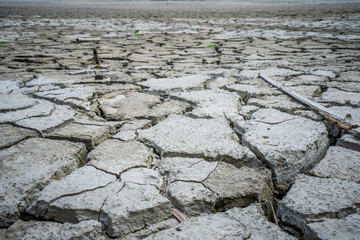 Lake of Dreams, a small but beautiful fishing port located in Wushantou Reservoir,   Guantian, Tainan, Taiwan is drying up with cracks and bamboo boats are left aside.