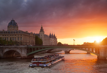 Conciergerie Building in Paris, France at sunset