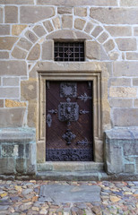 Wooden door of Black Tower in Ceske Budejovice, Czech republic
