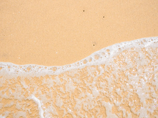 Sea shore. Tide on a sandy beach