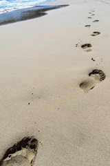 Fototapeta na wymiar Mallorca, White sand beach and some footprints