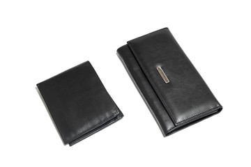 Man's and woman's black, leather wallet isolated on white background