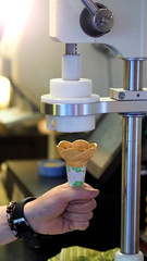 Soft serve ice cream cone made by machine
