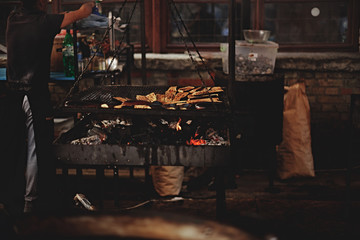 Cooking of street food. Customer service