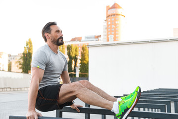 Handsome concentrated strong mature sportsman