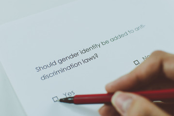 Poll question: Should gender be added to anti-discrimination laws? Answer: Yes. Closeup