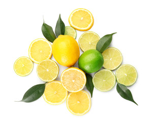 Composition with cut citrus fruits on white background