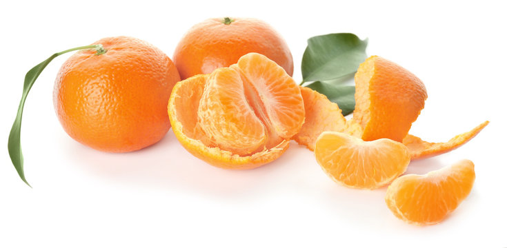Tasty ripe mandarins on white background