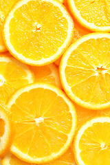 Sliced ripe citrus fruit as background