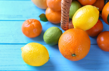 Ripe citrus fruits on table, closeup