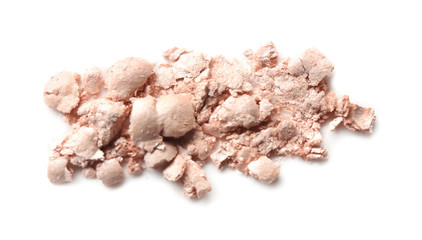Crushed highlighter on white background. Professional cosmetics
