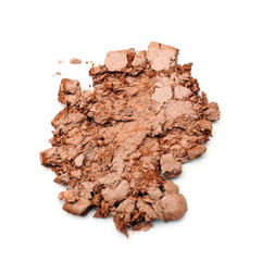 Crushed powder on white background. Professional cosmetics