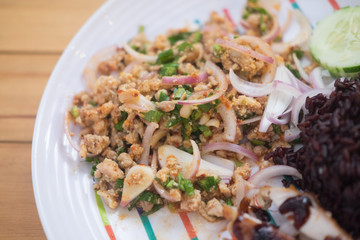 Thai style cuisine spicy minced pork with mix vegetable