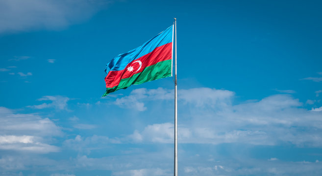 Azerbaijan Flag against blue sky