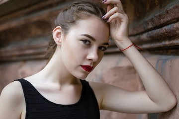 close-up portrait of attractive woman looking at camera