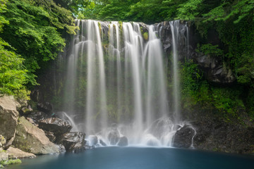Fototapeta na wymiar Cheonjeyeon Waterfall on Jeju Island, South Korea