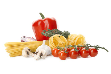 Uncooked pasta and products on white background
