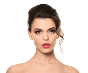 Portrait of young woman with beautiful professional makeup on white background