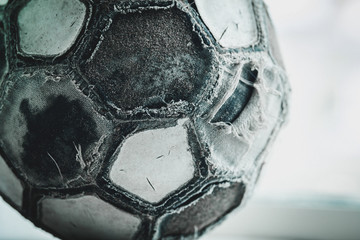 Old seasoned experienced ball for soccer, close-up, sport background concept