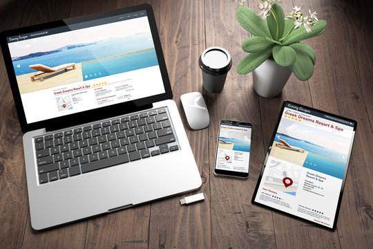 three devices on wooden desk top view directory resort