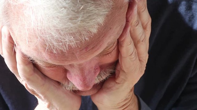 Senior man looking depressed and unhappy