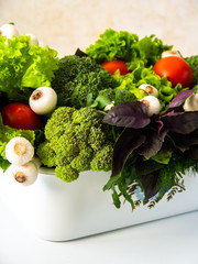 Fresh vegetables on a white background.