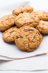 Chocolate oatmeal cookies on the  wooden background.