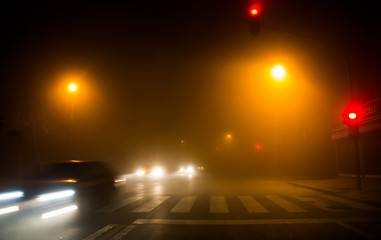 Fototapeta na wymiar Foggy traffic view in winter