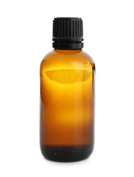 Bottle with essential oil on white background