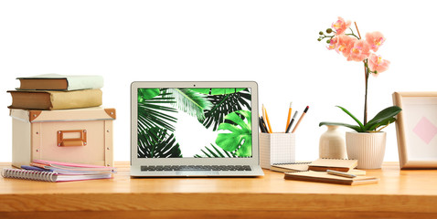 Comfortable home workplace with laptop on table
