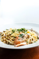 tasty pasta with salmon on a the table