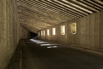 Dark road tunnel, underground road.