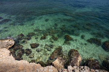 Les Rotes rocky beach near Sant Antonio cape, Denia, Alicante province, Costa Blanca, Spain