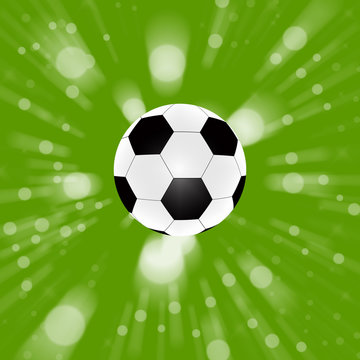 soccer ball on abstract green background