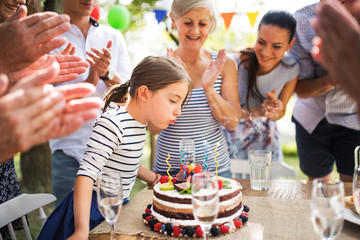 Family celebration or a garden party outside in the backyard.