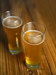 Two Beers on a wooden table in the pub