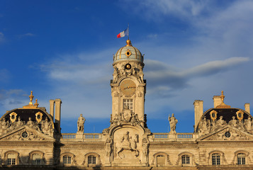 City hall (Hotel de Ville) of the city of Lyon in the warm, evening sunlight. France.