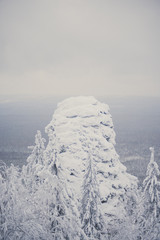 Winter Landscape with Stone Rock Covered with Snow - South Ural mountains, Russia