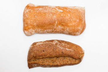 traditional white and black bread on white background