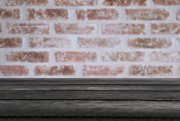 Selected focus empty black wooden table and wall texture or old black brick wall blur background image. for your photomontage or product display