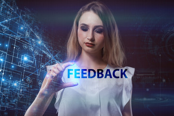The concept of business, technology, the Internet and the network. A young entrepreneur working on a virtual screen of the future and sees the inscription: Feedback
