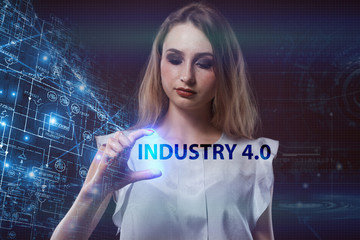 The concept of business, technology, the Internet and the network. A young entrepreneur working on a virtual screen of the future and sees the inscription: Industry 4.0