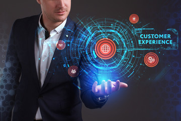 Business, Technology, Internet and network concept. Young businessman working on a virtual screen of the future and sees the inscription: Customer experience