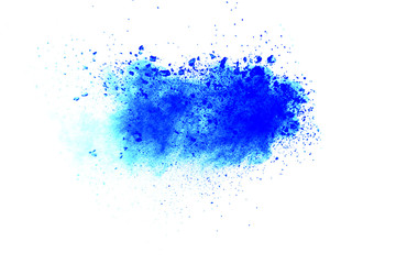 Abstract blue dust explosion on  black background. Blue powder splattered on dark background. Freeze motion of blue powder splash. Painted Holi in festival.