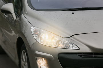 Obraz na płótnie Canvas car headlights close up